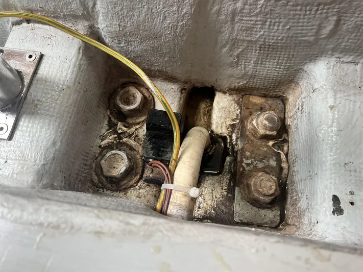 Nirvana Yacht Photos Pics Close-up of Beneteau First 40.7 yacht's keel bolts and wiring, 2001 model.