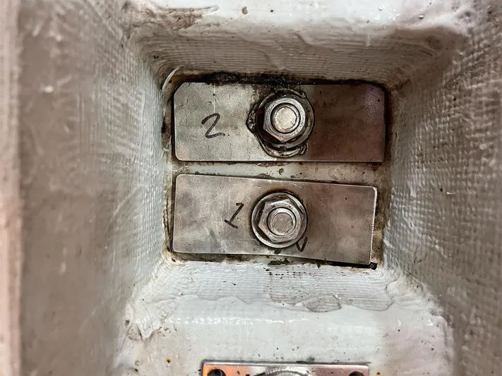 Nirvana Yacht Photos Pics Close-up of bolts on a 2001 Beneteau First 40.7 sailboat.