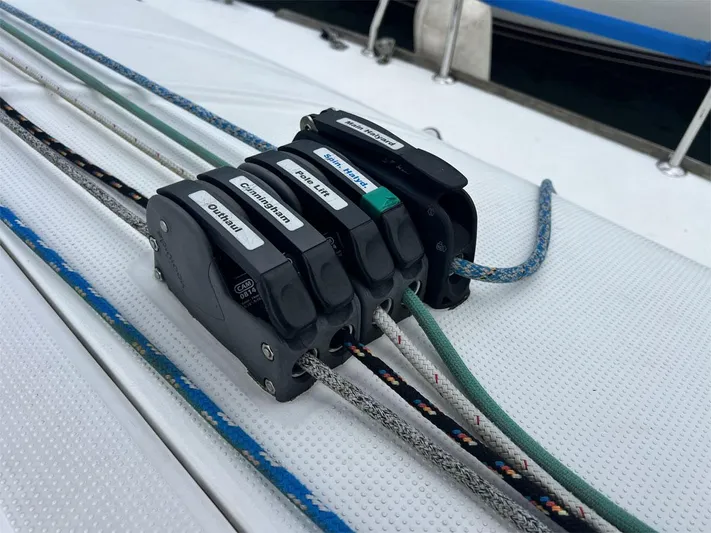 Nirvana Yacht Photos Pics Sailing ropes and cam cleats on a 2001 Beneteau First 40.7 yacht deck.