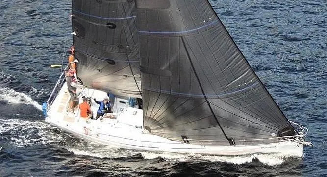 Nirvana Yacht Photos Pics Sailing yacht Beneteau First 40.7, 2001 model, navigating through open waters.