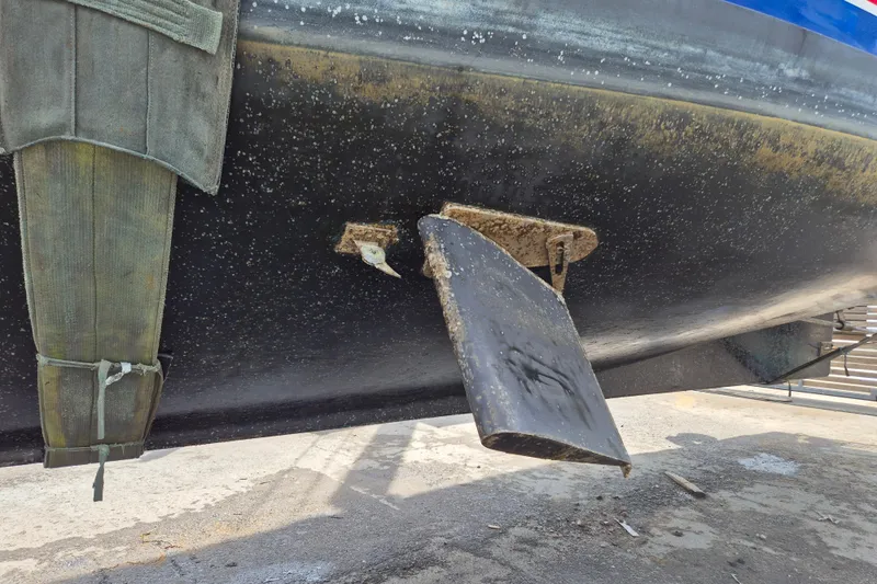 Ballena Blanca Yacht Photos Pics 1985 DeFever 44 Trawler hull with rudder and marine growth visible.