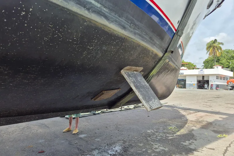 Ballena Blanca Yacht Photos Pics 1985 DeFever 44 Trawler hull on dry dock, showing keel and rudder details.