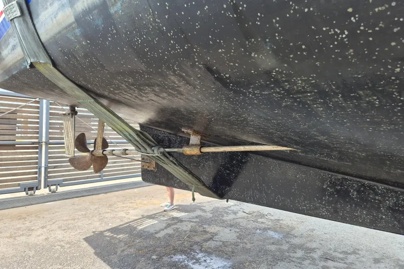 Ballena Blanca Yacht Photos Pics 1985 DeFever 44 Trawler hull and propeller detail in dry dock.
