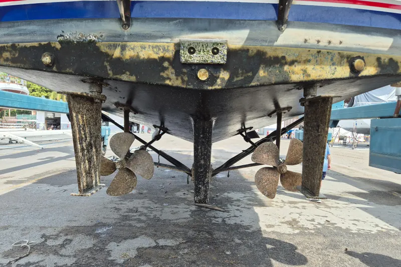 Ballena Blanca Yacht Photos Pics 1985 DeFever 44 Trawler's dual propellers and rudders in dry dock.