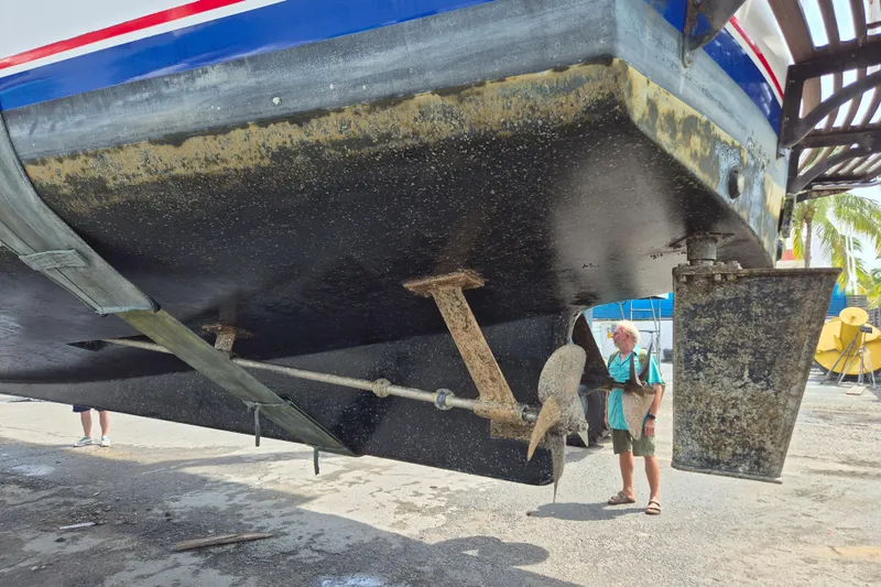 Ballena Blanca Yacht Photos Pics 1985 DeFever 44 Trawler hull inspection with visible propeller and rudder.