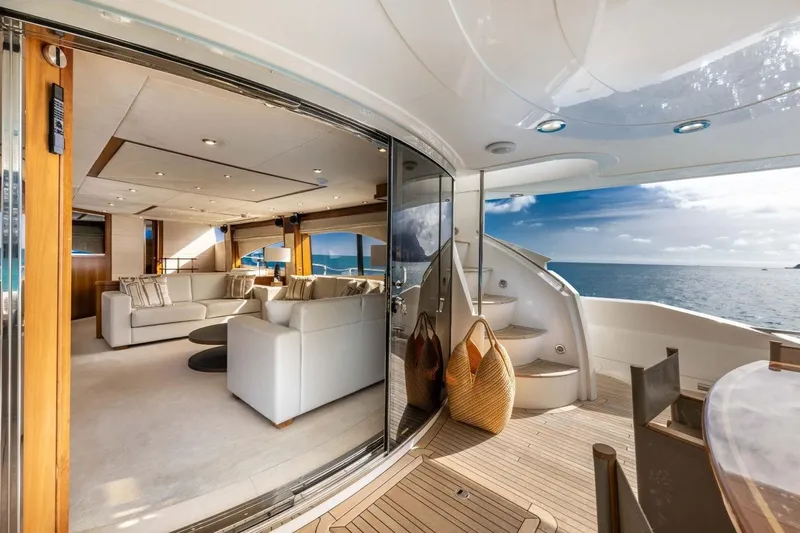 Sunseeker 90 Yacht Yacht Photos Pics Luxurious 2006 Sunseeker 90 Yacht interior with ocean view, featuring elegant seating and modern design.