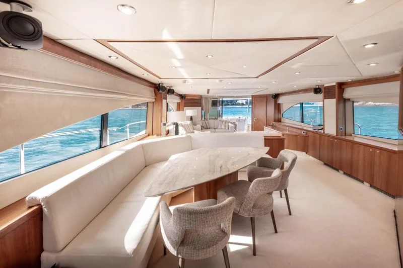 Sunseeker 90 Yacht Yacht Photos Pics Luxurious interior of 2006 Sunseeker 90 Yacht with elegant seating and ocean views.