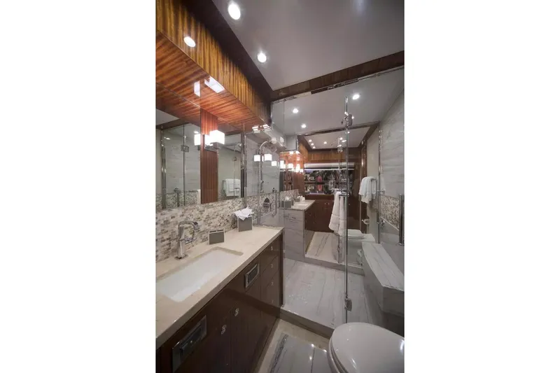 Renaissance Yacht Photos Pics Luxurious bathroom in 2016 Hargrave Raised Pilothouse yacht with elegant fixtures and modern design.
