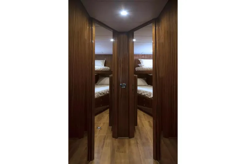 Renaissance Yacht Photos Pics Luxurious wooden interior of 2016 Hargrave Raised Pilothouse yacht with bunk beds.