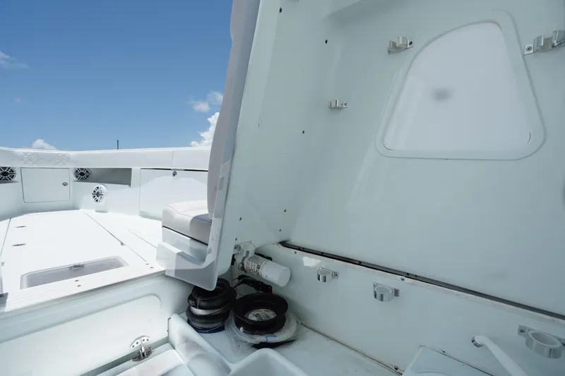  Yacht Photos Pics 2017 SeaVee Z39 boat interior with seating and storage compartments under a clear blue sky.