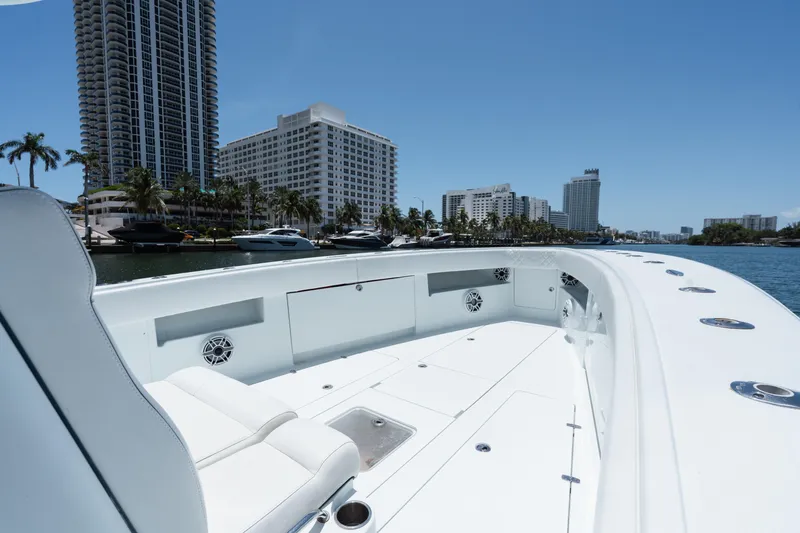  Yacht Photos Pics 2017 SeaVee Z39 boat on water, city skyline in background.