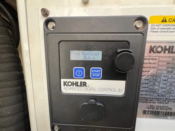 Zooropa Yacht Photos Pics Kohler digital control panel displaying engine runtime of 0.6 hours on a 2016 Scout 420 LXF.