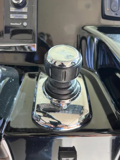 Zooropa Yacht Photos Pics Close-up of joystick control on 2016 Scout 420 LXF boat dashboard.