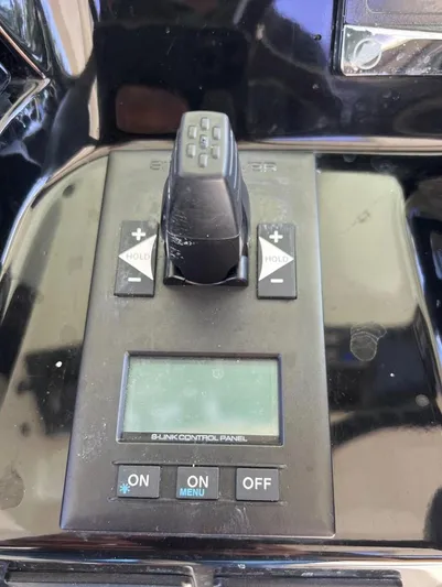 Zooropa Yacht Photos Pics Control panel of a 2016 Scout 420 LXF boat with joystick and display.