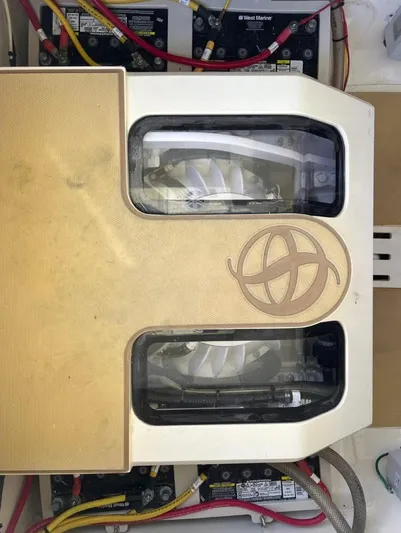 Zooropa Yacht Photos Pics Engine compartment of a 2016 Scout 420 LXF boat with visible wiring and components.