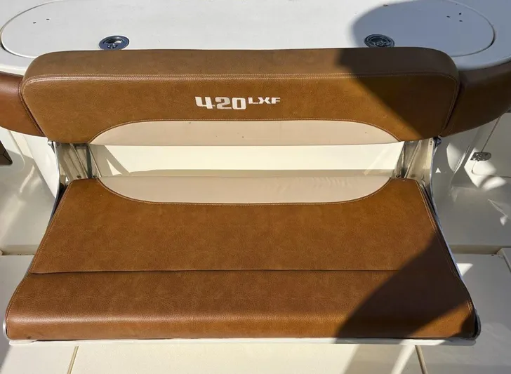 Zooropa Yacht Photos Pics Brown leather seat on 2016 Scout 420 LXF boat.