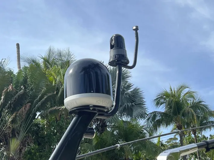 Zooropa Yacht Photos Pics Radar equipment on a 2016 Scout 420 LXF boat against a tropical backdrop.