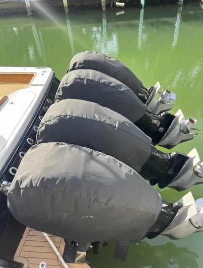 Zooropa Yacht Photos Pics Four covered outboard motors on a 2016 Scout 420 LXF boat.