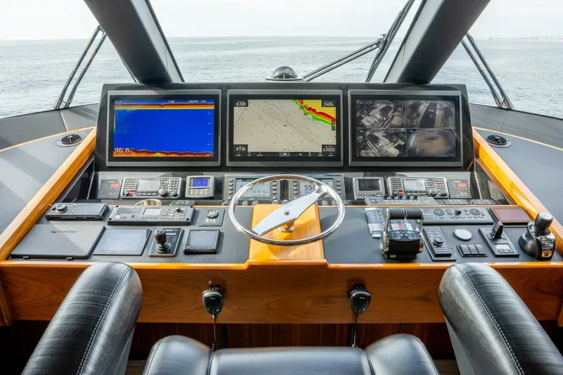 Silvertime Yacht Photos Pics Cockpit of 2018 Viking 80 Enclosed Bridge yacht with advanced navigation systems.