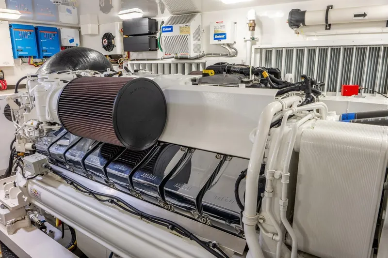 Silvertime Yacht Photos Pics Engine room of 2018 Viking 80 Enclosed Bridge yacht, showcasing advanced machinery.