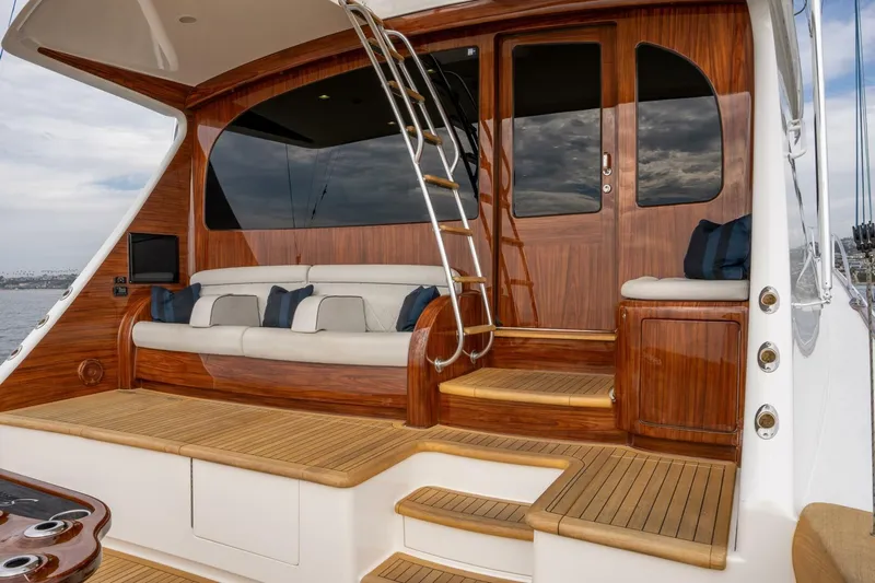 Silvertime Yacht Photos Pics Luxurious 2018 Viking 80 Enclosed Bridge yacht with elegant wood finishes and comfortable seating.