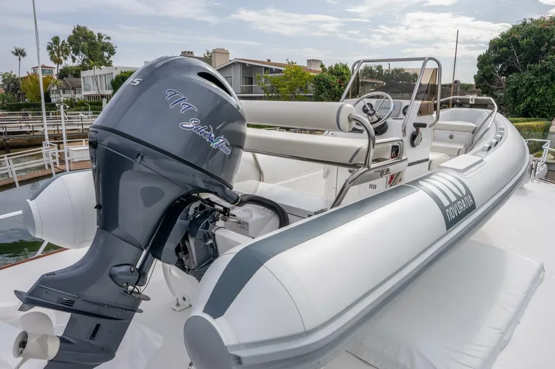 Silvertime Yacht Photos Pics 2018 Viking 80 Enclosed Bridge with Novurania tender and outboard motor.