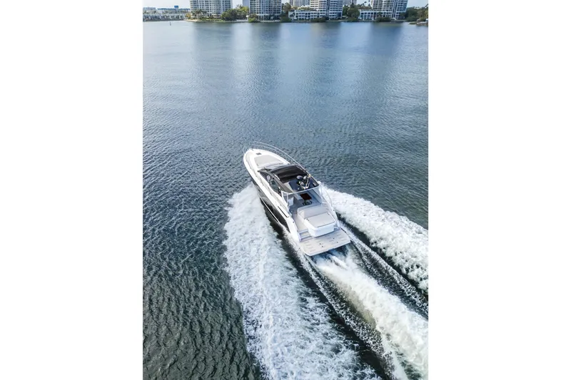  Yacht Photos Pics Aerial view of 2020 Azimut Atlantis 45 yacht cruising on calm waters.