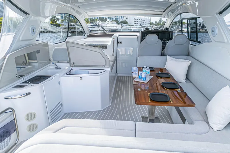  Yacht Photos Pics Luxurious interior of 2020 Azimut Atlantis 45 yacht with elegant seating and dining area.