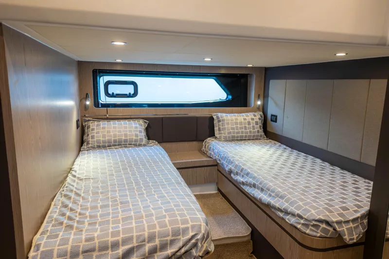  Yacht Photos Pics Interior cabin of 2020 Azimut Atlantis 45 yacht with twin beds and modern design.