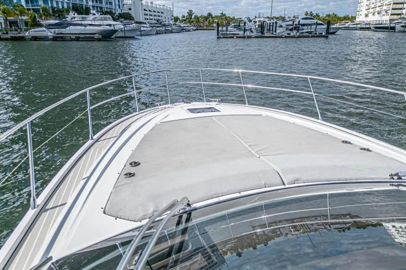  Yacht Photos Pics Front deck view of 2020 Azimut Atlantis 45 yacht in a marina setting.