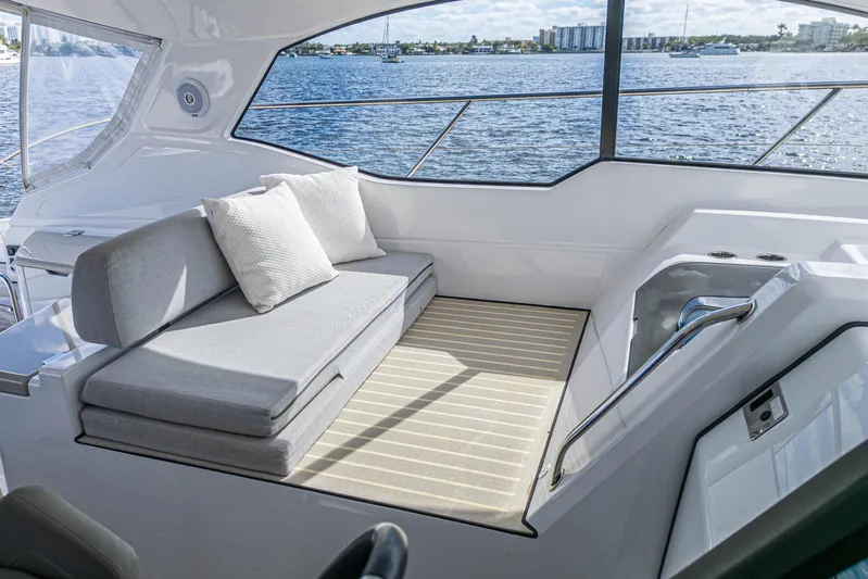  Yacht Photos Pics Luxurious seating area on 2020 Azimut Atlantis 45 yacht with waterfront view.