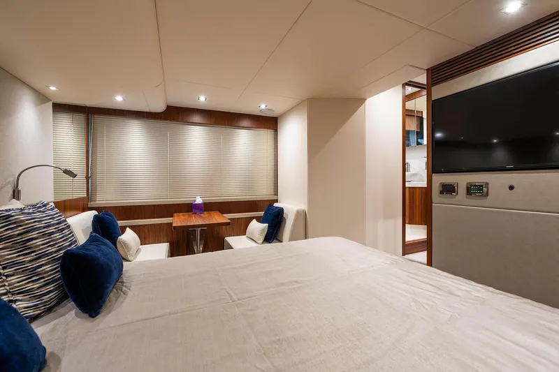  Yacht Photos Pics Luxurious interior of 2020 Sunseeker Manhattan 52 yacht with modern furnishings and elegant decor.
