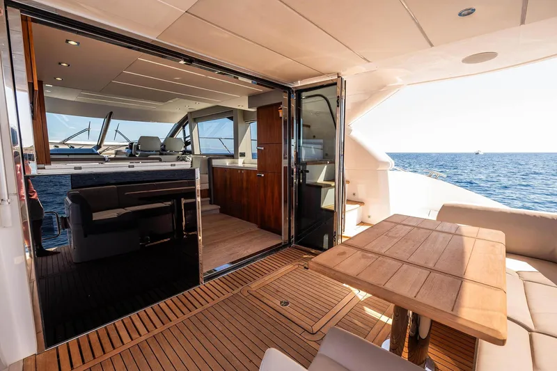 Yacht Photos Pics Luxurious 2020 Sunseeker Manhattan 52 yacht interior with ocean view and elegant wooden finishes.