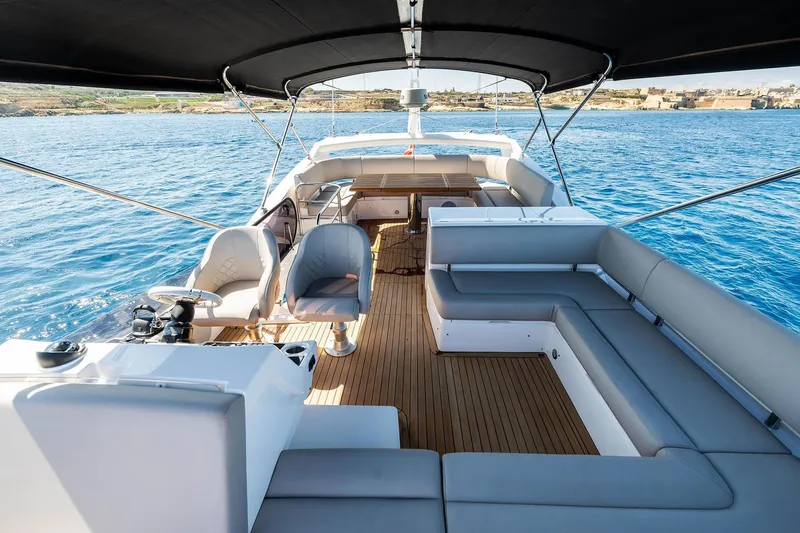  Yacht Photos Pics Luxurious 2020 Sunseeker Manhattan 52 yacht interior with seating and ocean view.
