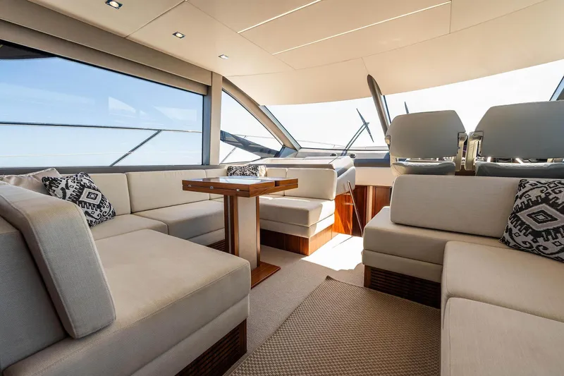  Yacht Photos Pics Luxurious interior of 2020 Sunseeker Manhattan 52 yacht with elegant seating and modern design.