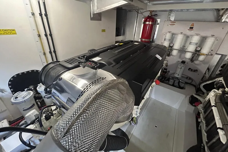  Yacht Photos Pics Engine room of 2020 Maritimo M64 yacht, featuring advanced machinery and equipment.