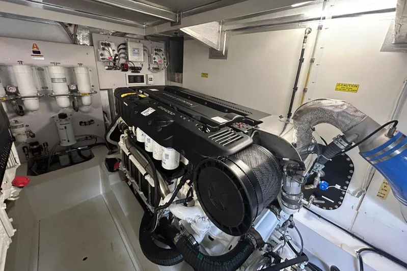 Yacht Photos Pics Engine room of 2020 Maritimo M64 yacht, showcasing advanced machinery and components.