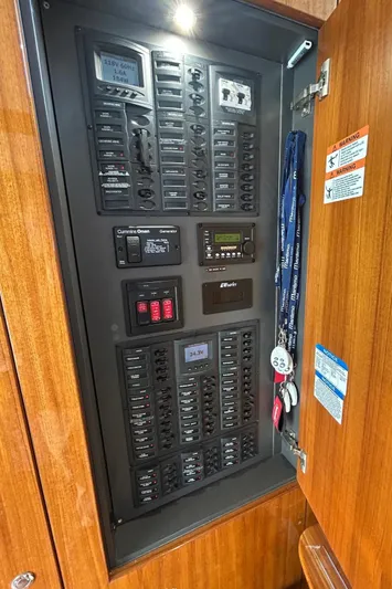  Yacht Photos Pics Electrical panel inside 2020 Maritimo M64 yacht, featuring switches and controls.