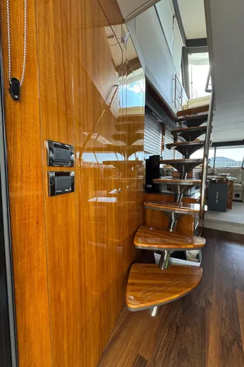  Yacht Photos Pics Interior of 2020 Maritimo M64 yacht with wooden stairs and sleek design.