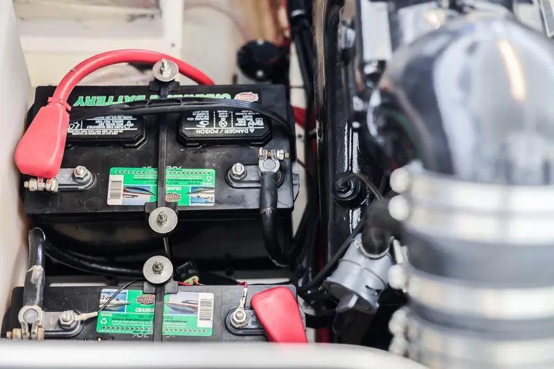 Tarini Yacht Photos Pics Batteries in a 2020 Regal 28 Express boat engine compartment.