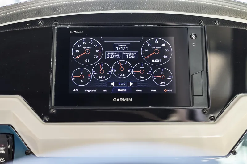 Tarini Yacht Photos Pics Garmin GPS display on 2020 Regal 28 Express boat dashboard showing engine metrics.