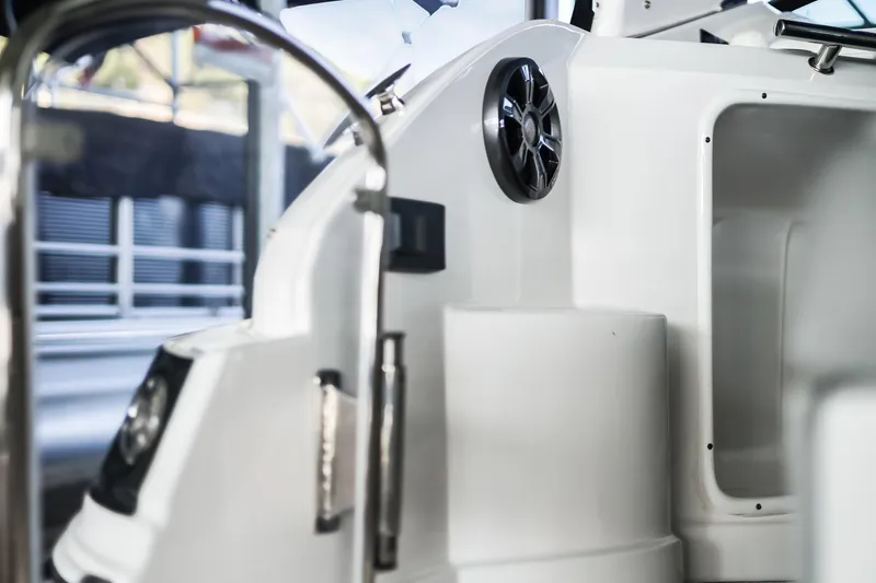 Tarini Yacht Photos Pics Interior view of a 2020 Regal 28 Express boat, featuring sleek white design elements.