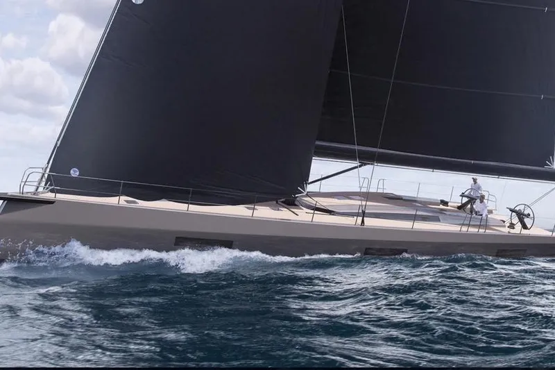 Yacht Photos Pics 2026 Ice Yachts 80 sailing on open sea with sleek black sails.