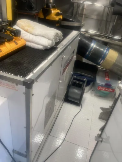 Silver Seas Yacht Photos Pics Engine room of a 1998 Burger Raised Pilothouse yacht with tools and equipment.