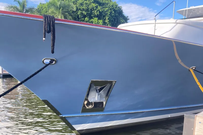 Silver Seas Yacht Photos Pics 1998 Burger Raised Pilothouse yacht docked, showcasing sleek hull design and mooring lines.