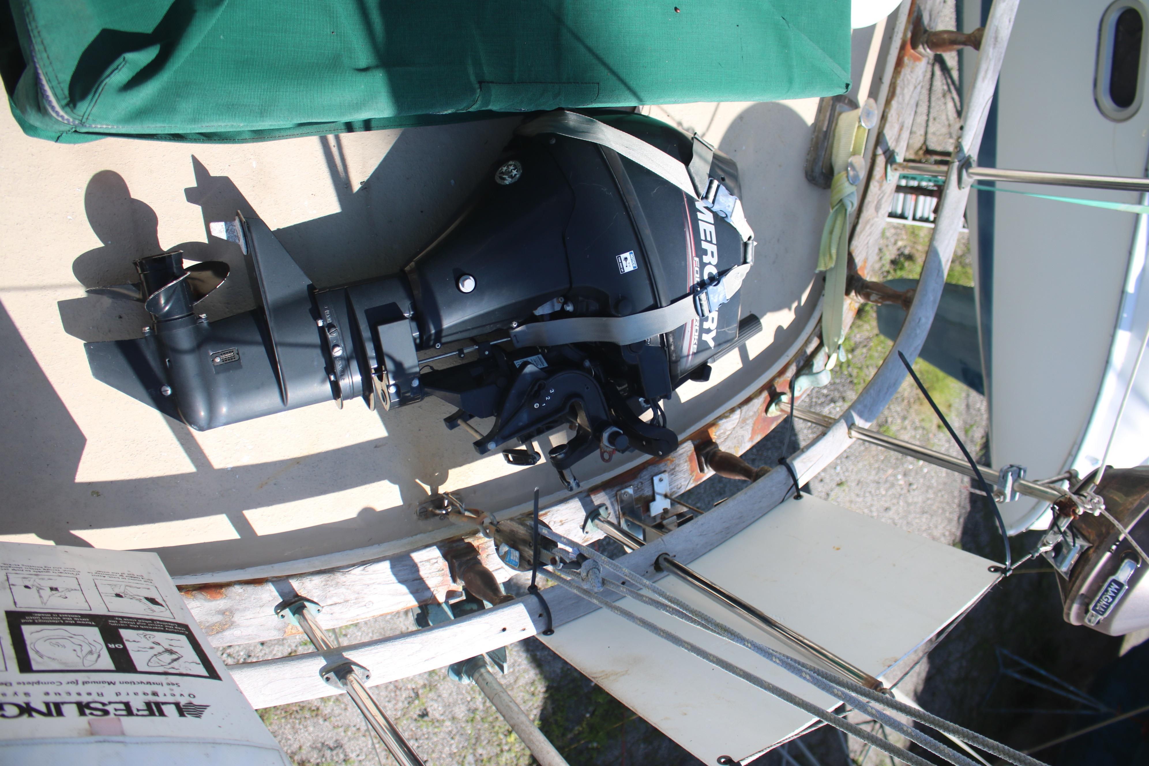 1981 Hardin 45 Voyager sailboat with Mercury outboard motor on deck.