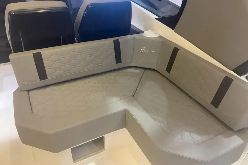  Yacht Photos Pics Luxurious seating in 2026 Hanover 387 Tuxedo Luxury Edition boat interior.