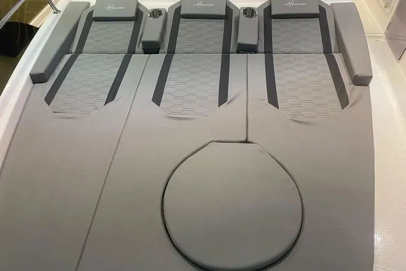  Yacht Photos Pics Luxurious seating on 2026 Hanover 387 Tuxedo Luxury Edition boat, featuring sleek design and comfort.