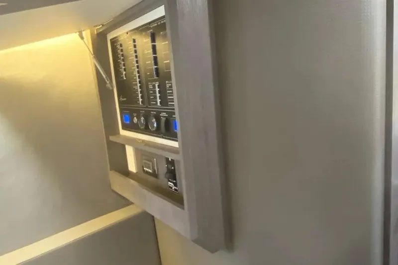  Yacht Photos Pics Control panel inside 2026 Hanover 387 Tuxedo Luxury Edition RV, featuring modern design and lighting.