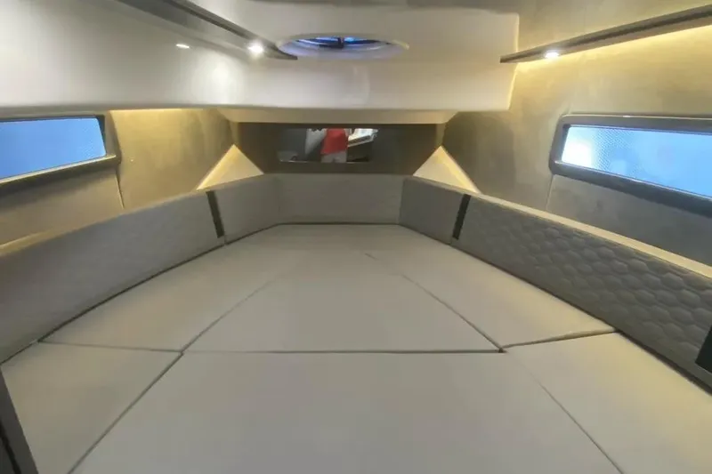  Yacht Photos Pics Interior of 2026 Hanover 387 Tuxedo Luxury Edition boat, featuring elegant seating and ambient lighting.
